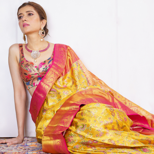 Yellow Kanjivaram Saree with Pink Border