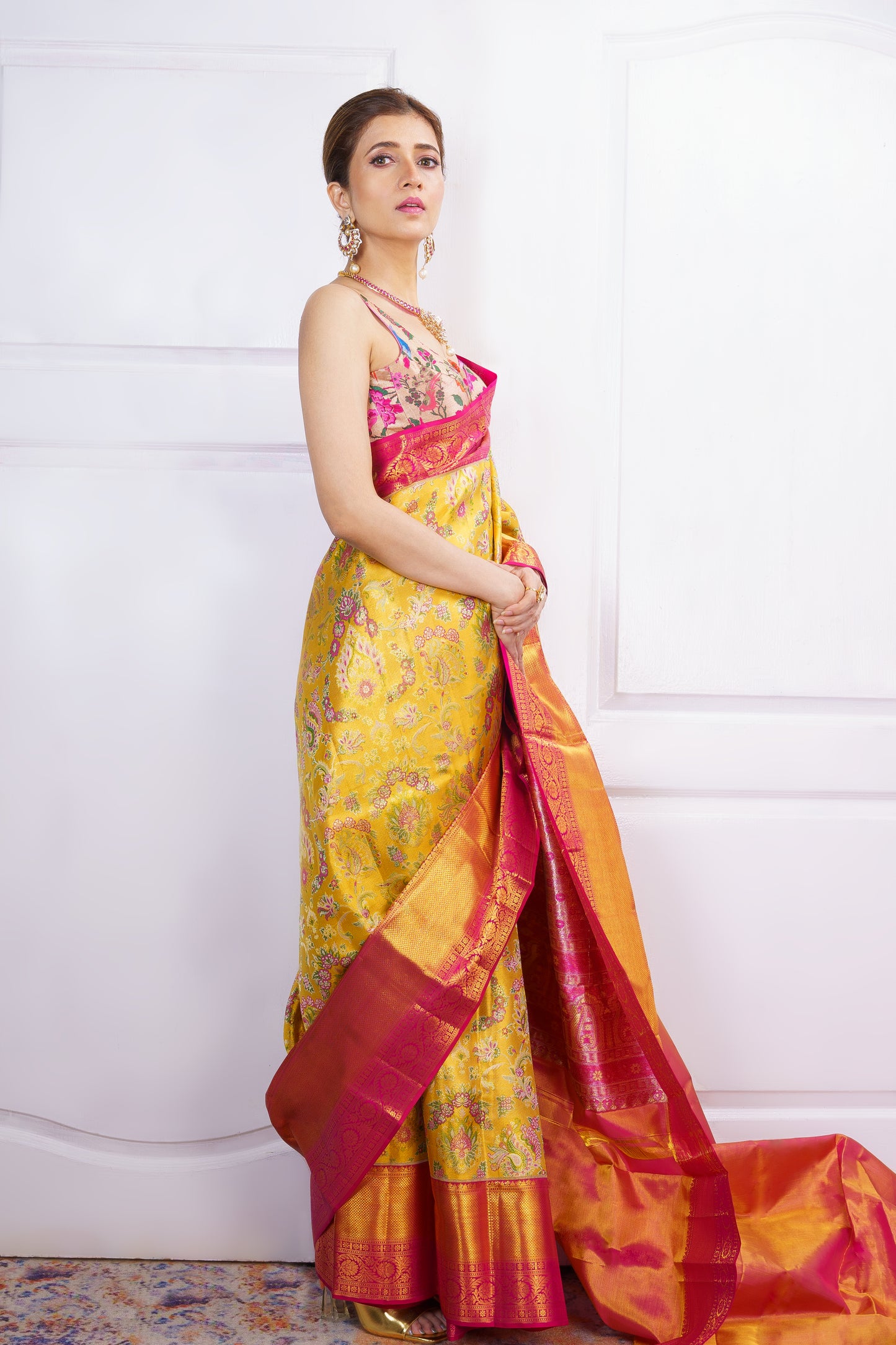 Yellow Kanjivaram Saree with Pink Border