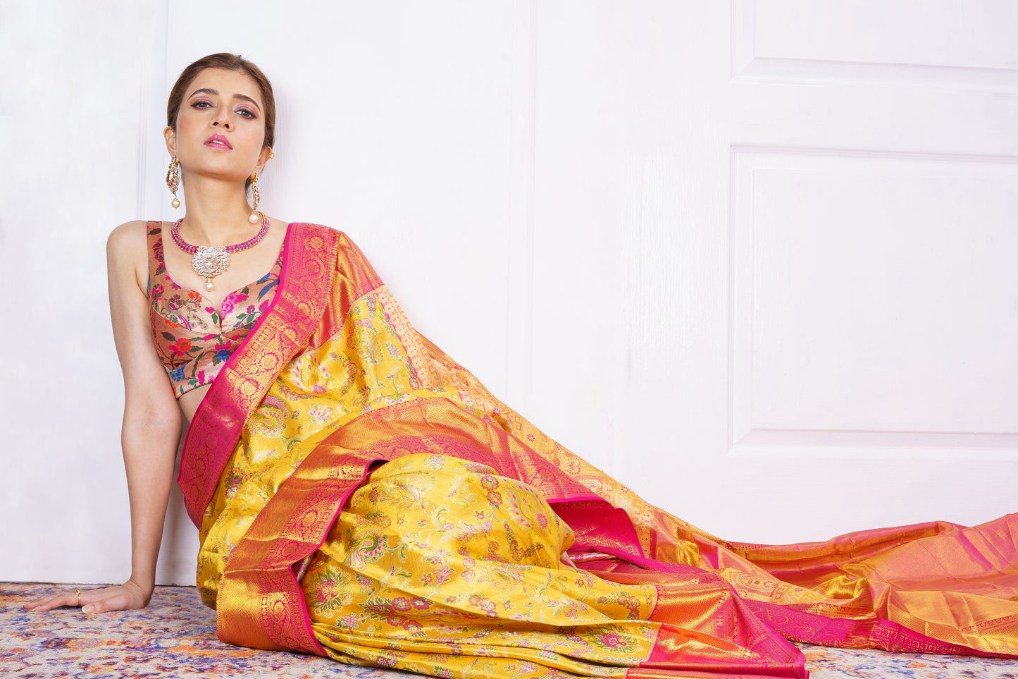 Yellow Kanjivaram Saree with Pink Border