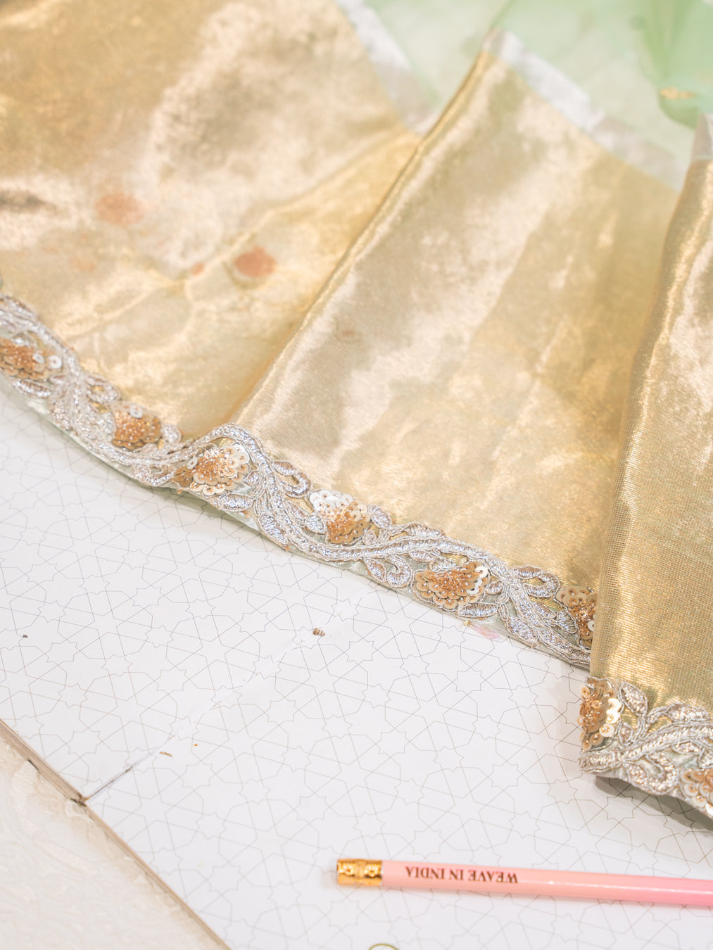 Mint Green Silk Organza Saree with All Over Buttis and Silver Zardozi Border