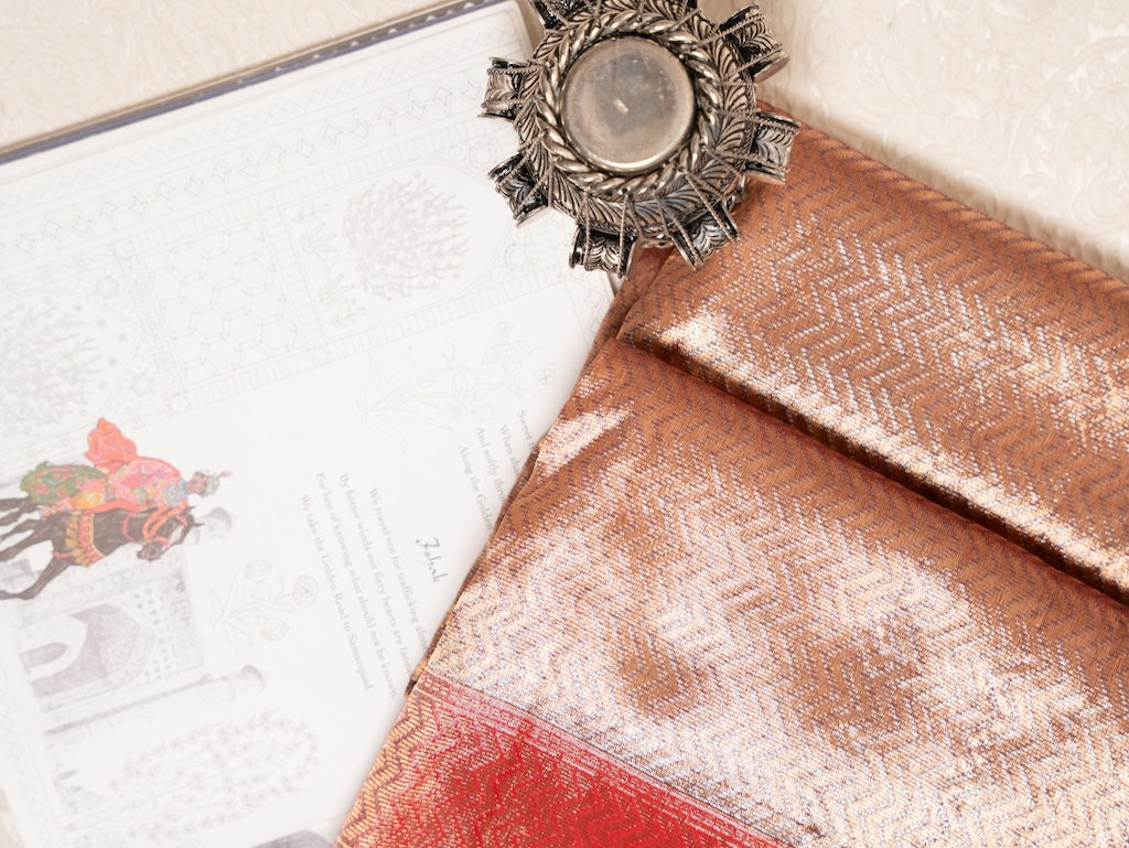 Amber Glow Real Zari Jamawar Kota with Red Border
