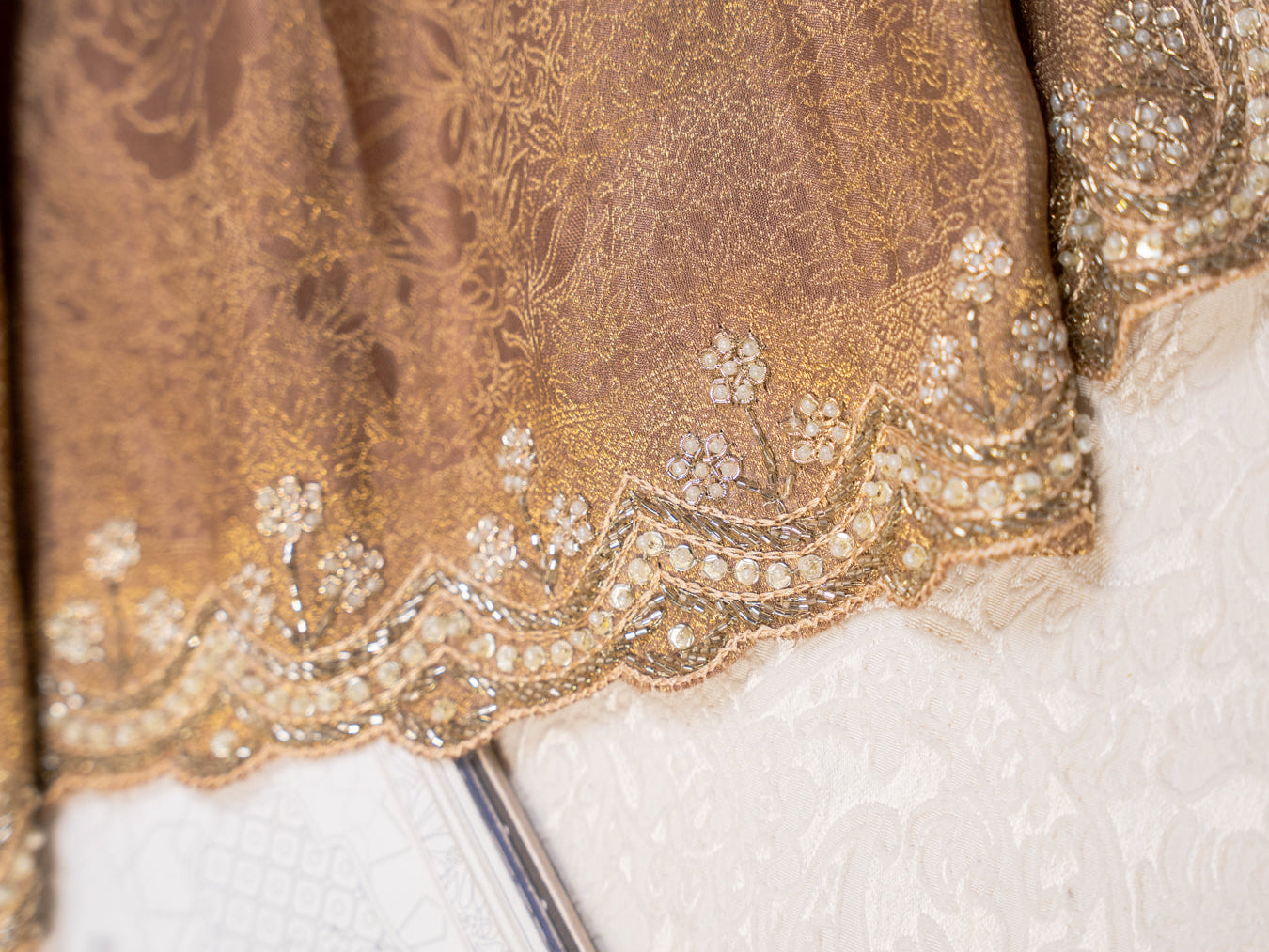 Bronze Tissue Silk Saree with All Over Motifs and Embroidered Border