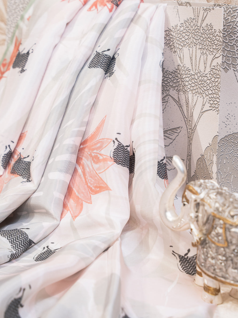 Pearl White Silk Chiffon Saree with Cow and Lotus Motifs