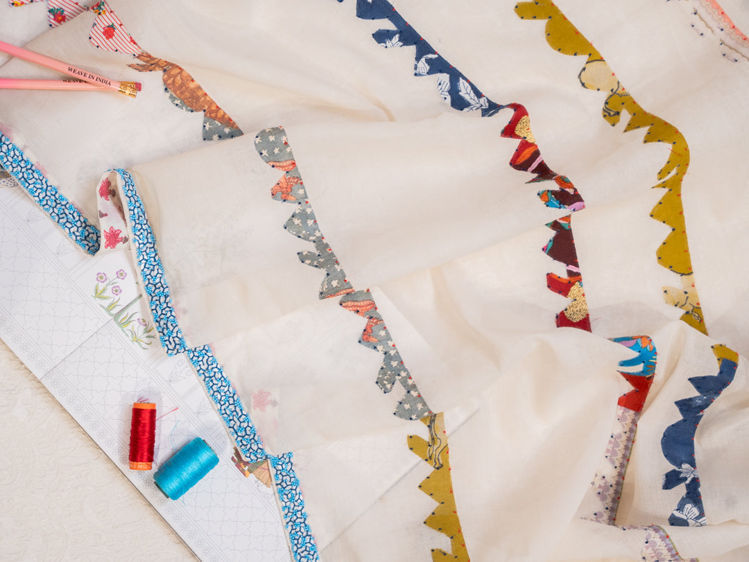 Off White Cotton Saree with Colourful Patchwork Stripes and Beaded Border