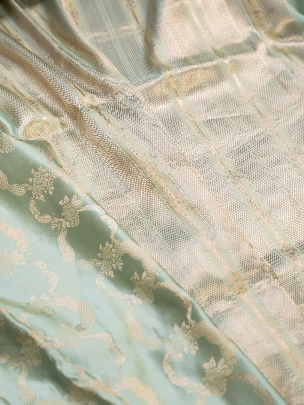 Mint Green Pure Silk Kanjivaram Saree with All Over Motifs