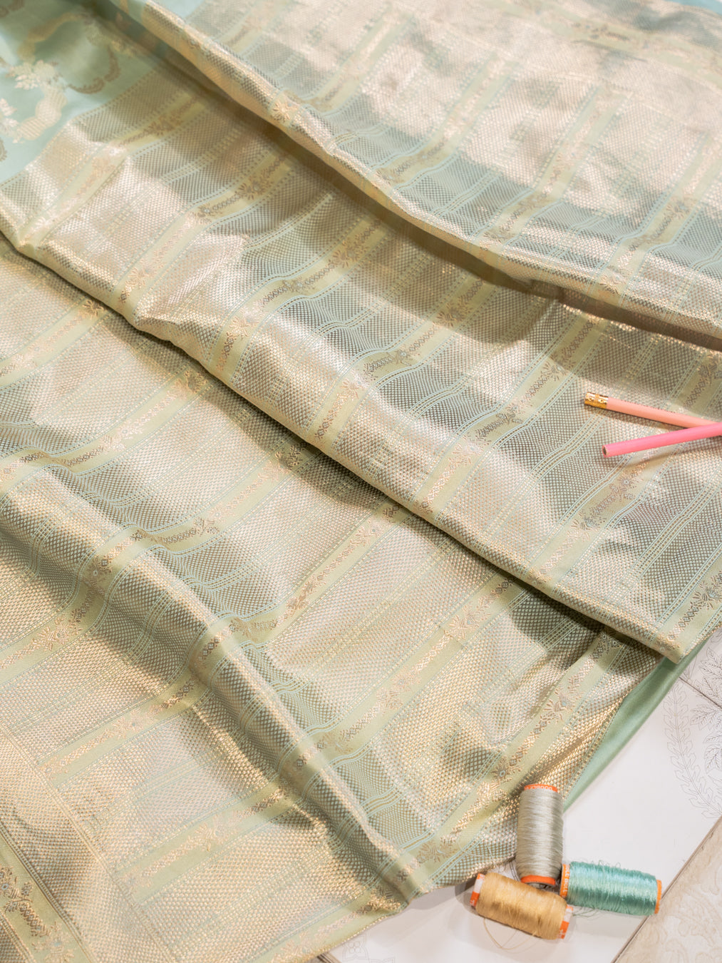 Mint Green Pure Silk Kanjivaram Saree with All Over Motifs