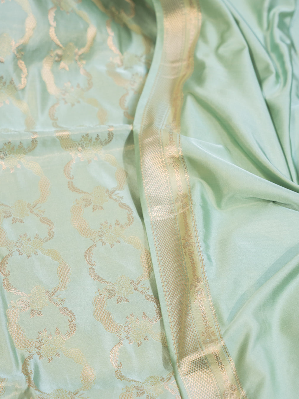 Mint Green Pure Silk Kanjivaram Saree with All Over Motifs
