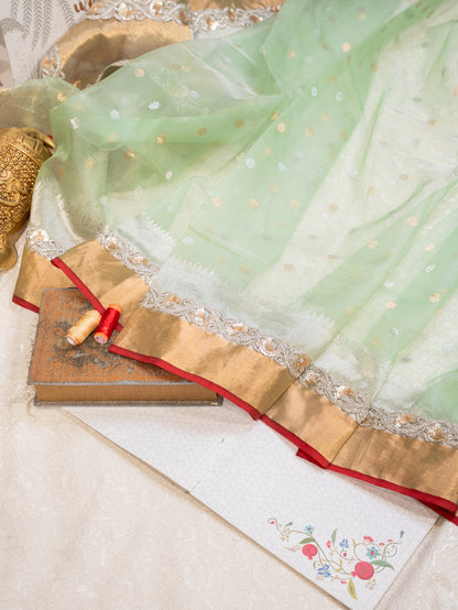 Mint Green Silk Organza Saree with All Over Buttis and Silver Zardozi Border
