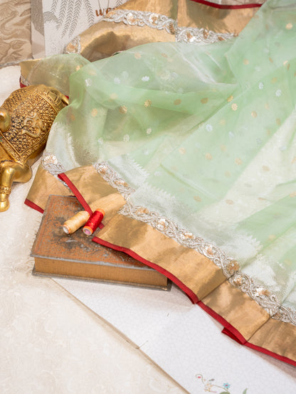 Mint Green Silk Organza Saree with All Over Buttis and Silver Zardozi Border
