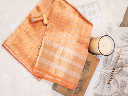 Peach Silk Tissue Saree with Golden Border and All Over Buttis