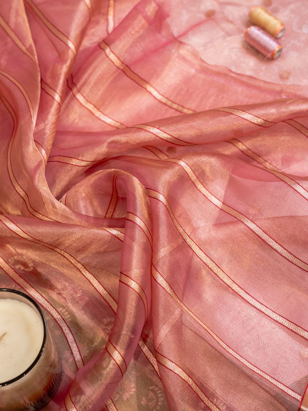 Coral Silk Tissue Saree with Golden Border and All Over Buttis