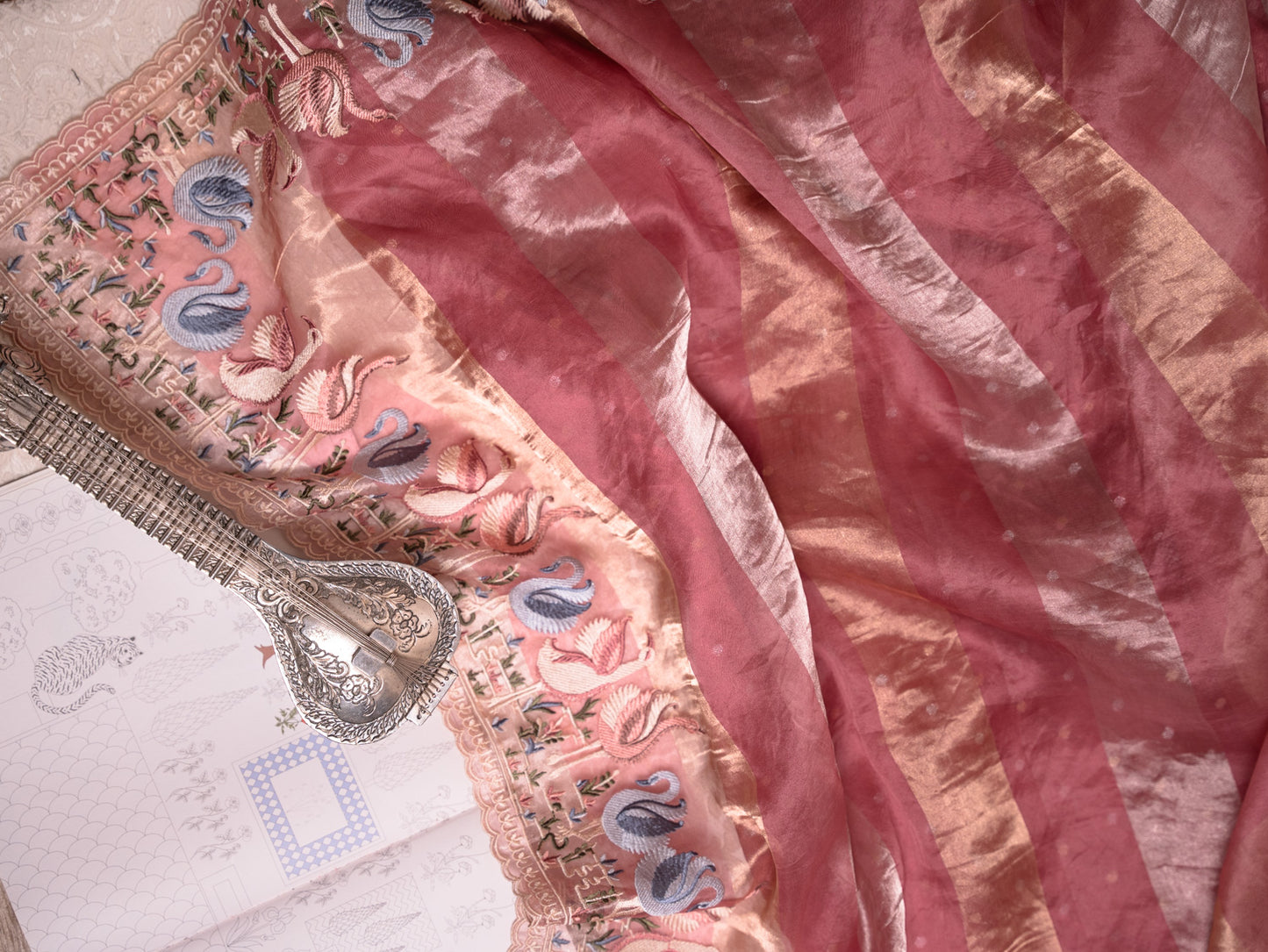 Blush Pink Tissue Silk Saree with blue Embroidered Flamingo Border
