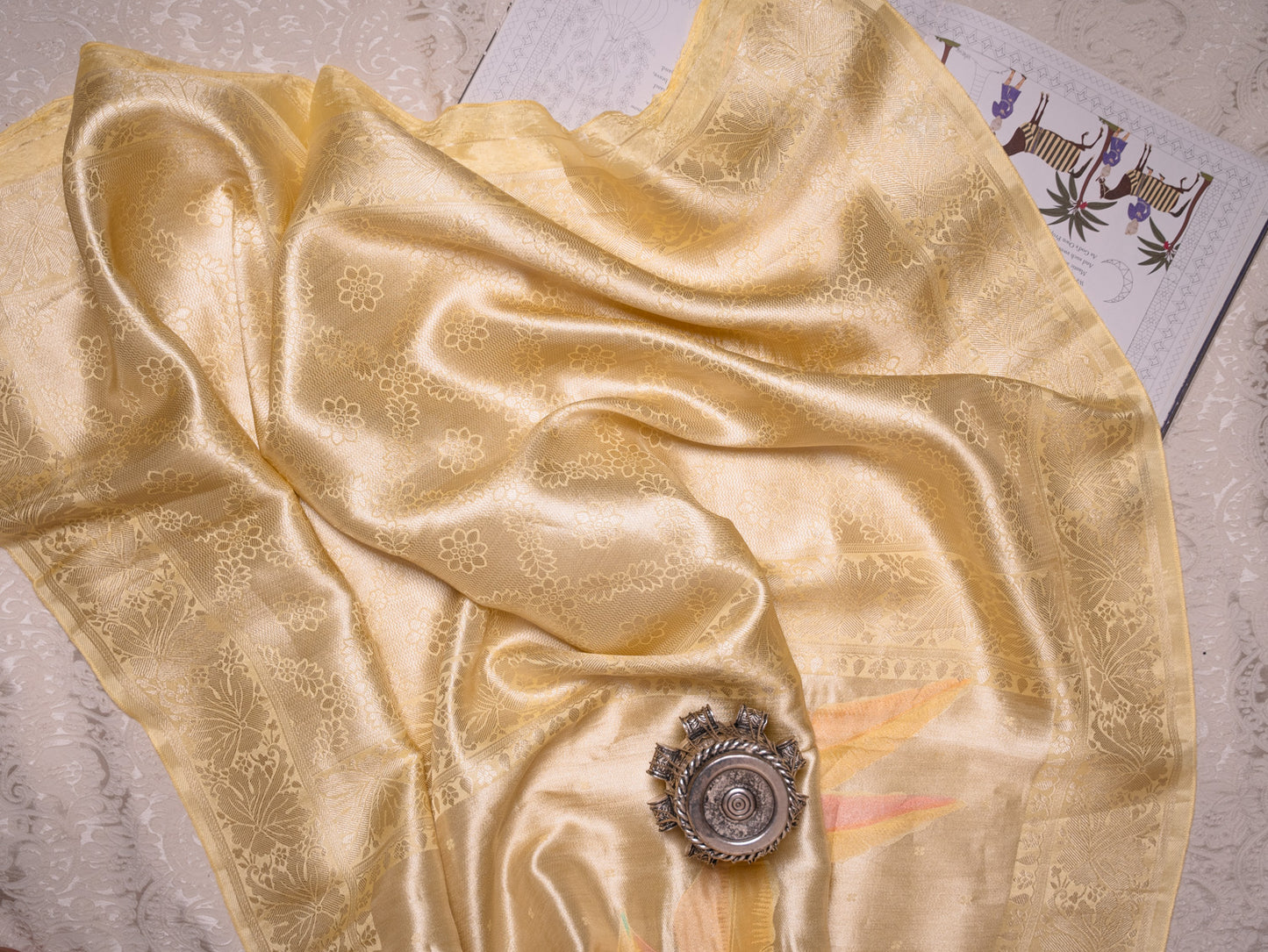 Pastel Yellow Silk Tissue Saree with Hand-Brush Motifs