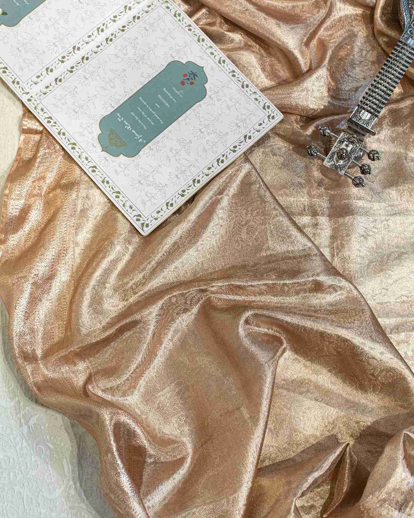 Rosegold Zari Tissue Saree with Floral Brocade and Peacock Motifs
